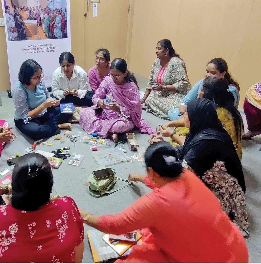 Women entrepreneurs at a community development session
